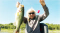 Angler holding a large bass with Bobba-Gamoochie bobber in hand